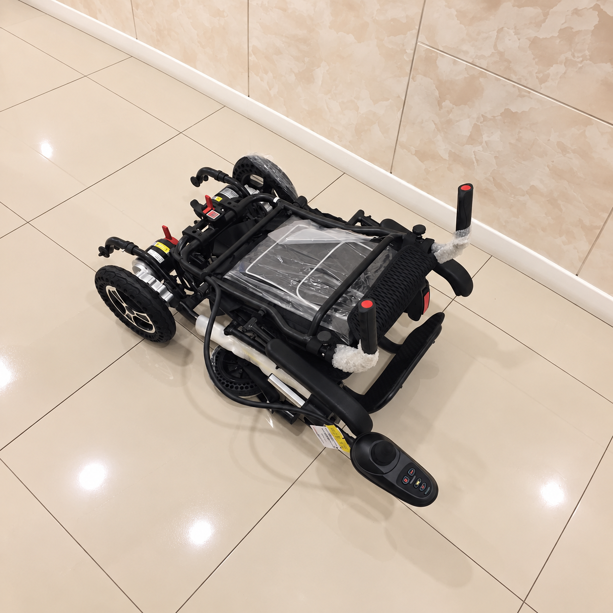 Felco DX FMEW001 electric wheelchair folded for storage