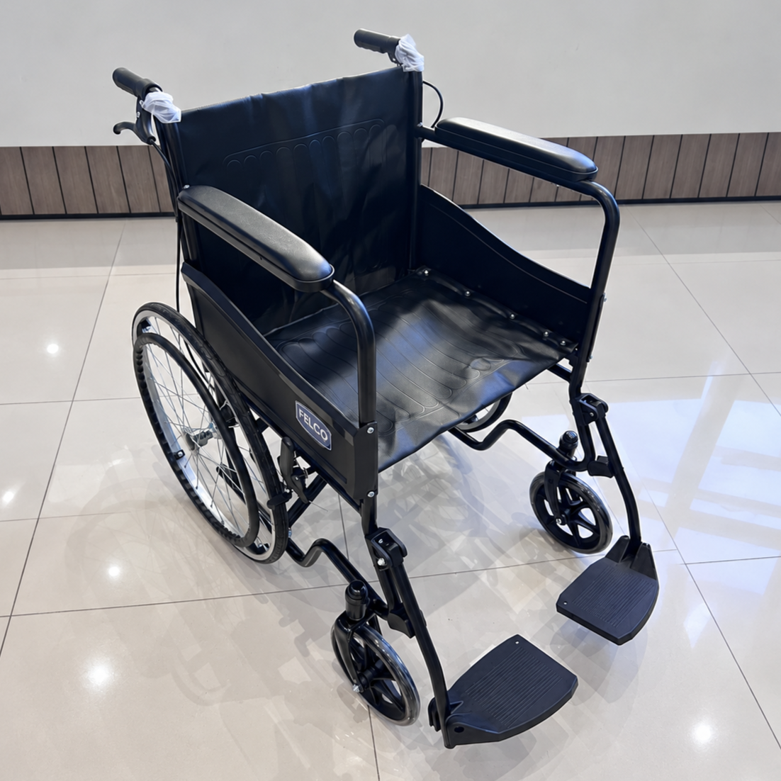 Felco S Plus FMW045 standard wheelchair  in black with fixed armrests